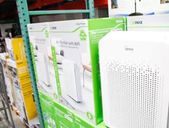 Air purifiers displayed on shelves